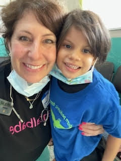 Dr Derrow with patient