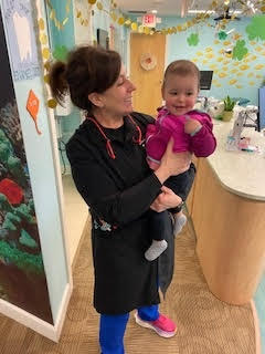 Dr. Derrow with baby